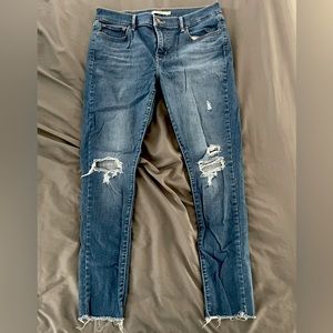 Levi's 710 Super Skinny distressed jeans size 32 women's
